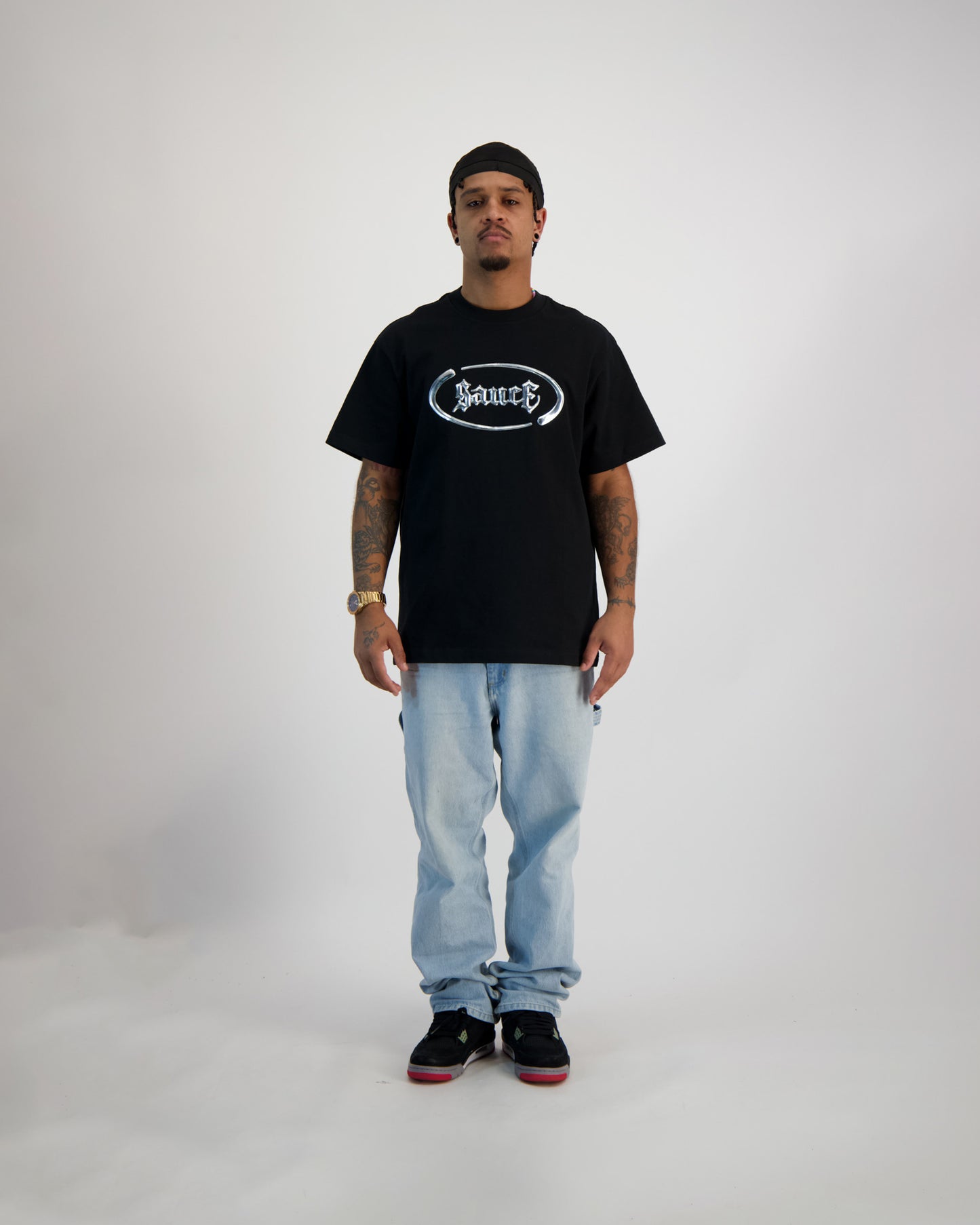 Sauce Model wearing a T -Shirt in Black full body picture