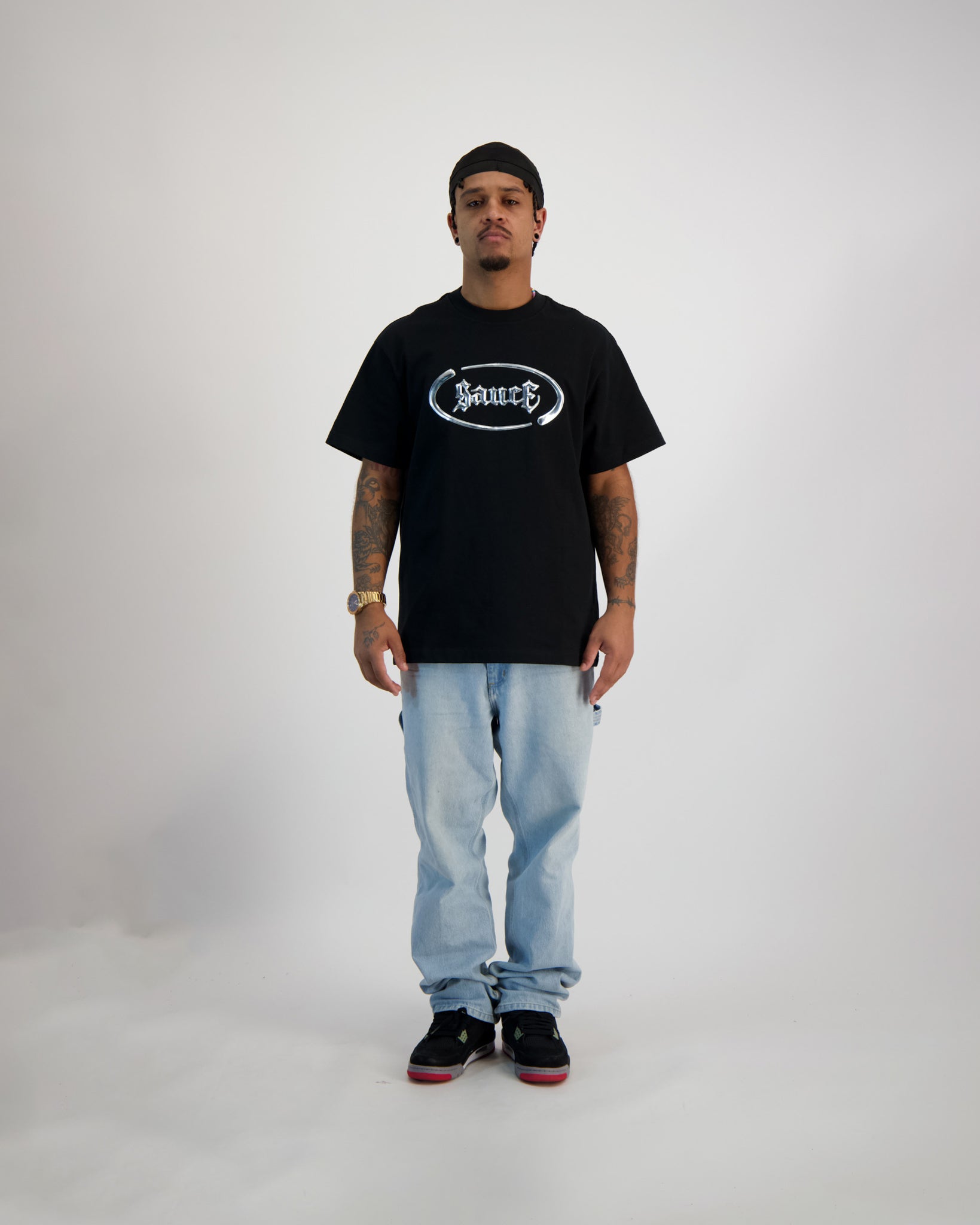 Sauce Model wearing a T -Shirt in Black full body picture