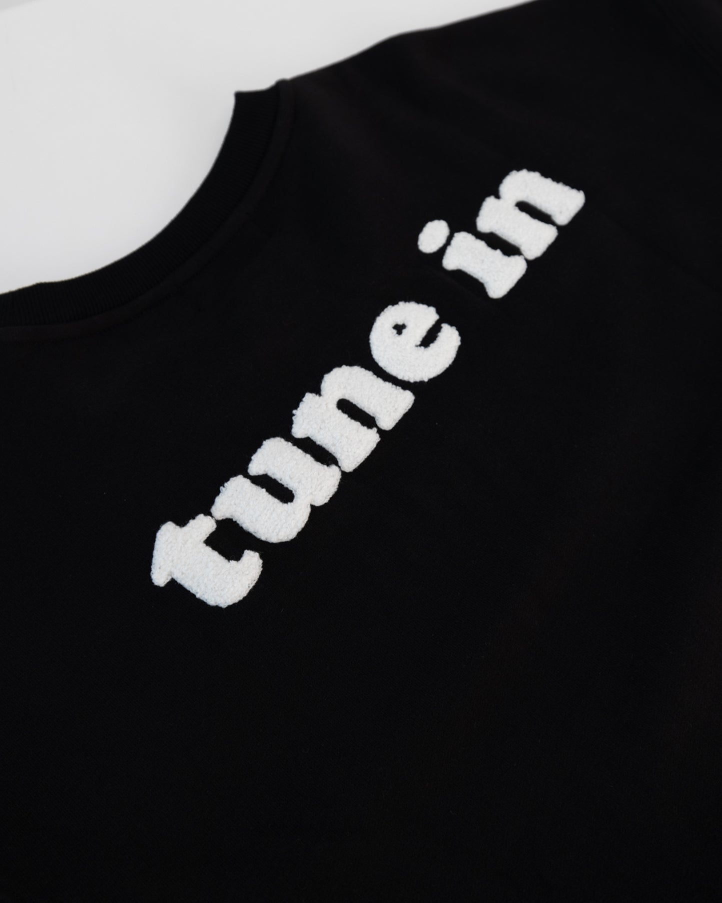 A close-up shot of the tune in Long Sleeve