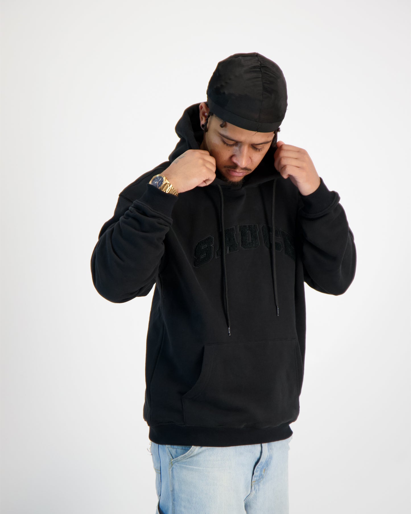 A model wearing a Sauce Hoodie Picture from Front